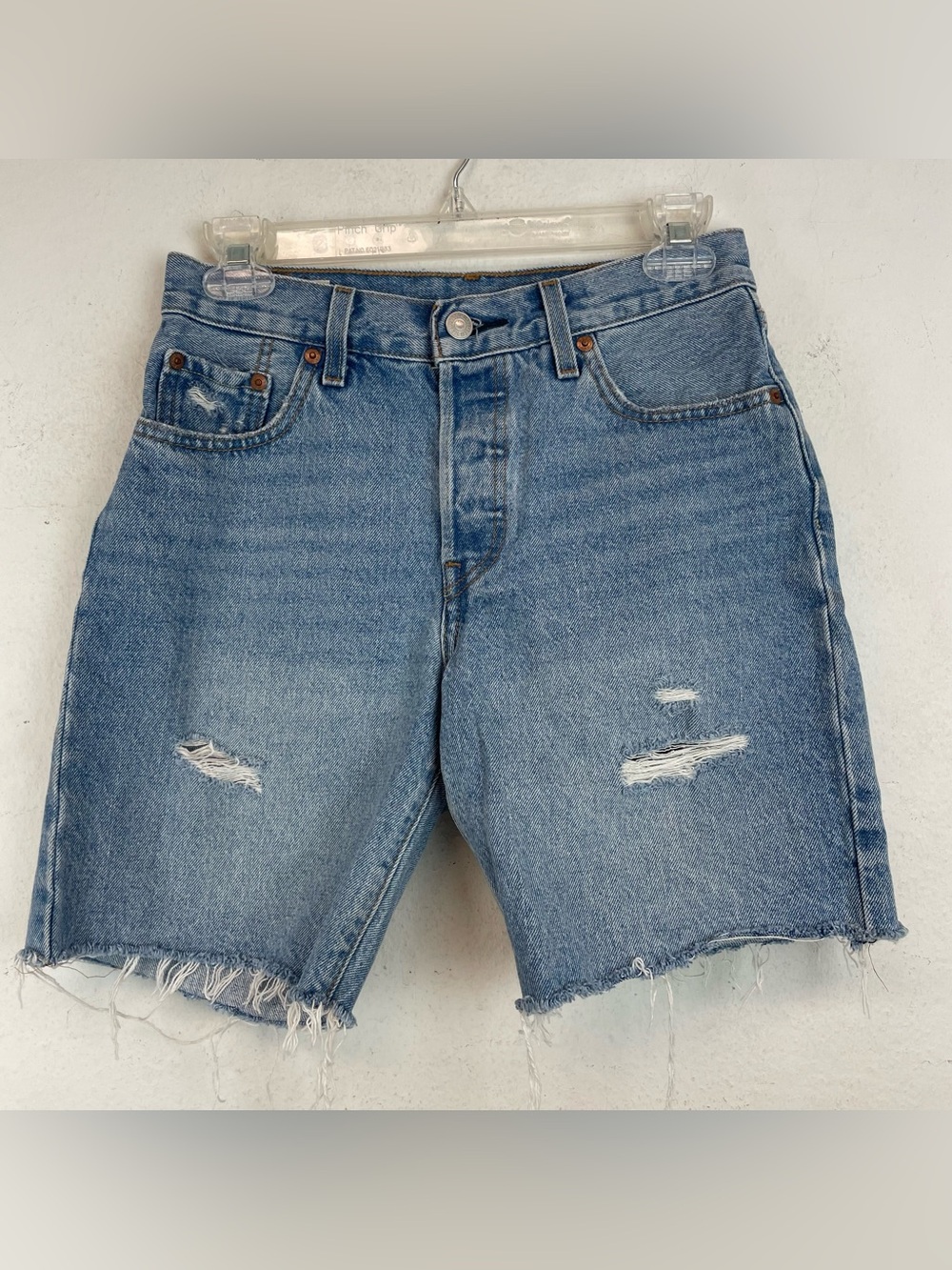 High-Rise Distressed Denim Shorts in Blue Levi 501